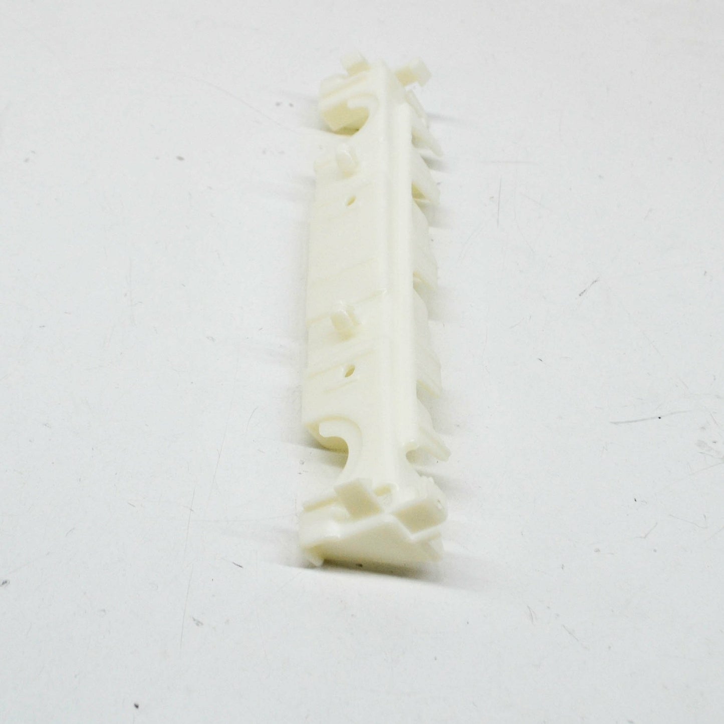 NEW MB E COUPE C207 FRONT RIGHT SIDE PLASTIC SKIRT HOLDER A2076980127 ORIGINAL