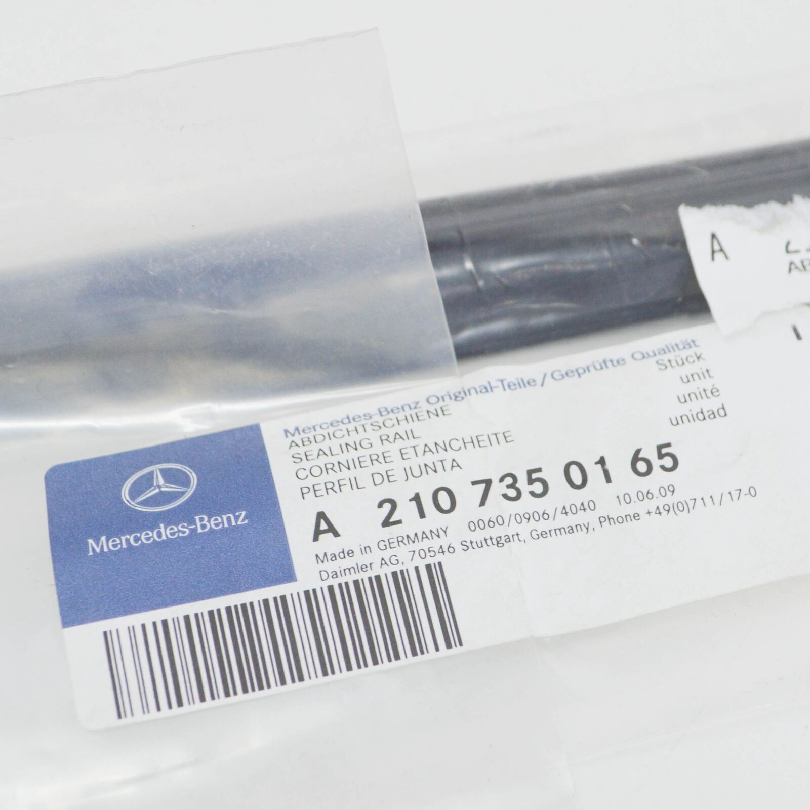 NEW MERCEDES E S210 W210 SEALING RAIL OUTSIDE WAIST LINE A2107350165 ORIGINAL