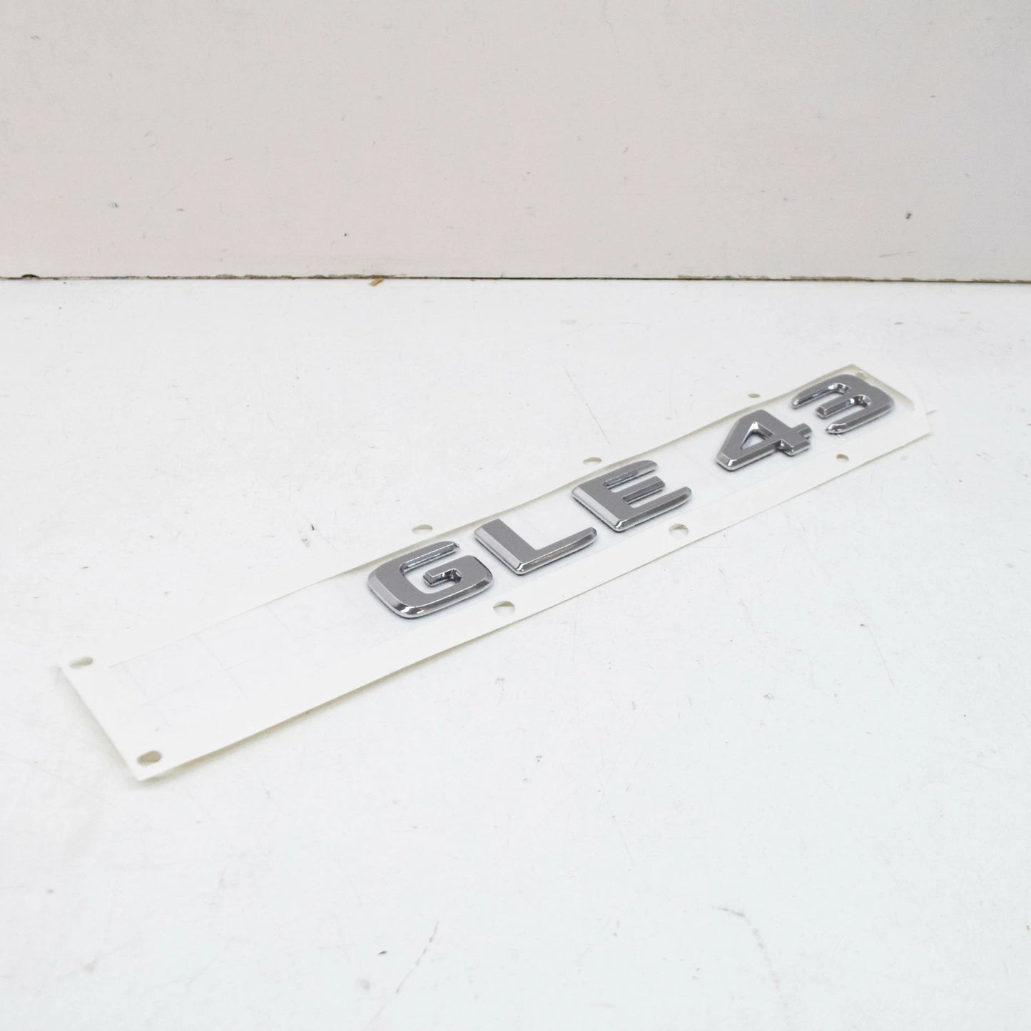 NEW MB GLE W166 REAR TRUNK BOOTLID EMBLEM BADGE A1668176400