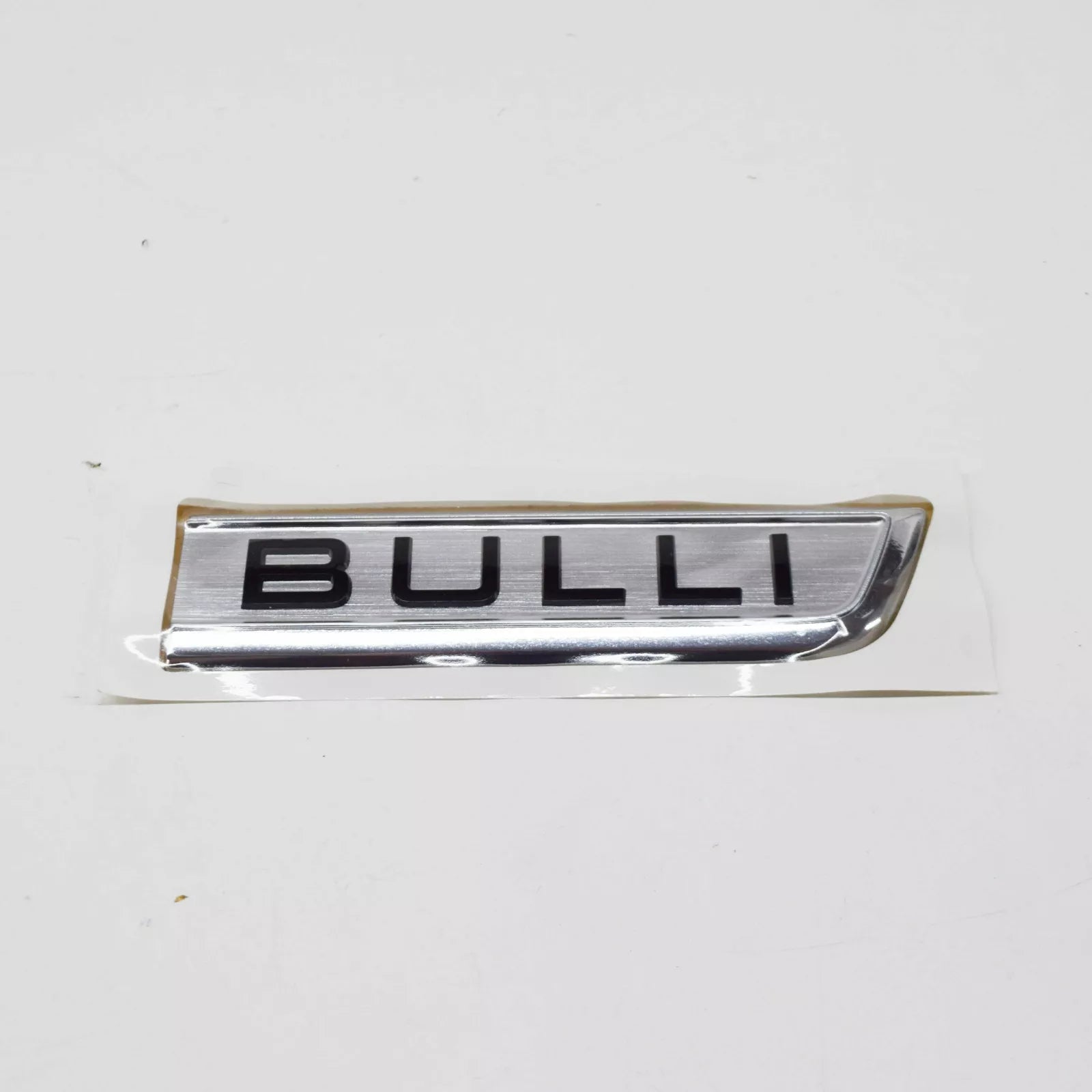 NEW VW TRANSPORTER T6 FRONT LEFT DOOR BADGE SELF-ADHESIVE 7E0853688ACBX ORIGINAL