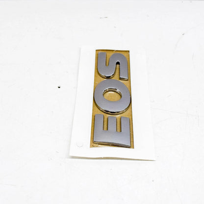 NEW VW EOS HIGH CHROME EOS INSCRIPTION 1Q0853687C739 ORIGINAL