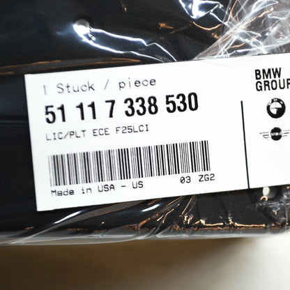 NEW BMW X3 F25 FRONT BUMPER LICENSE NUMBER PLATE HOLDER ECE 51117338530 ORIGINAL