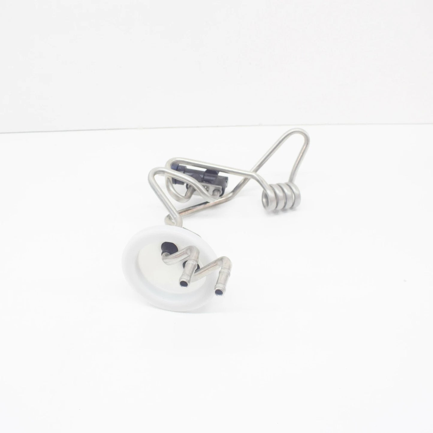 NEW MERCEDES-BENZ GLE W166 WASHER FLUID HEAT EXCHANGER A1668300461 ORIGINAL