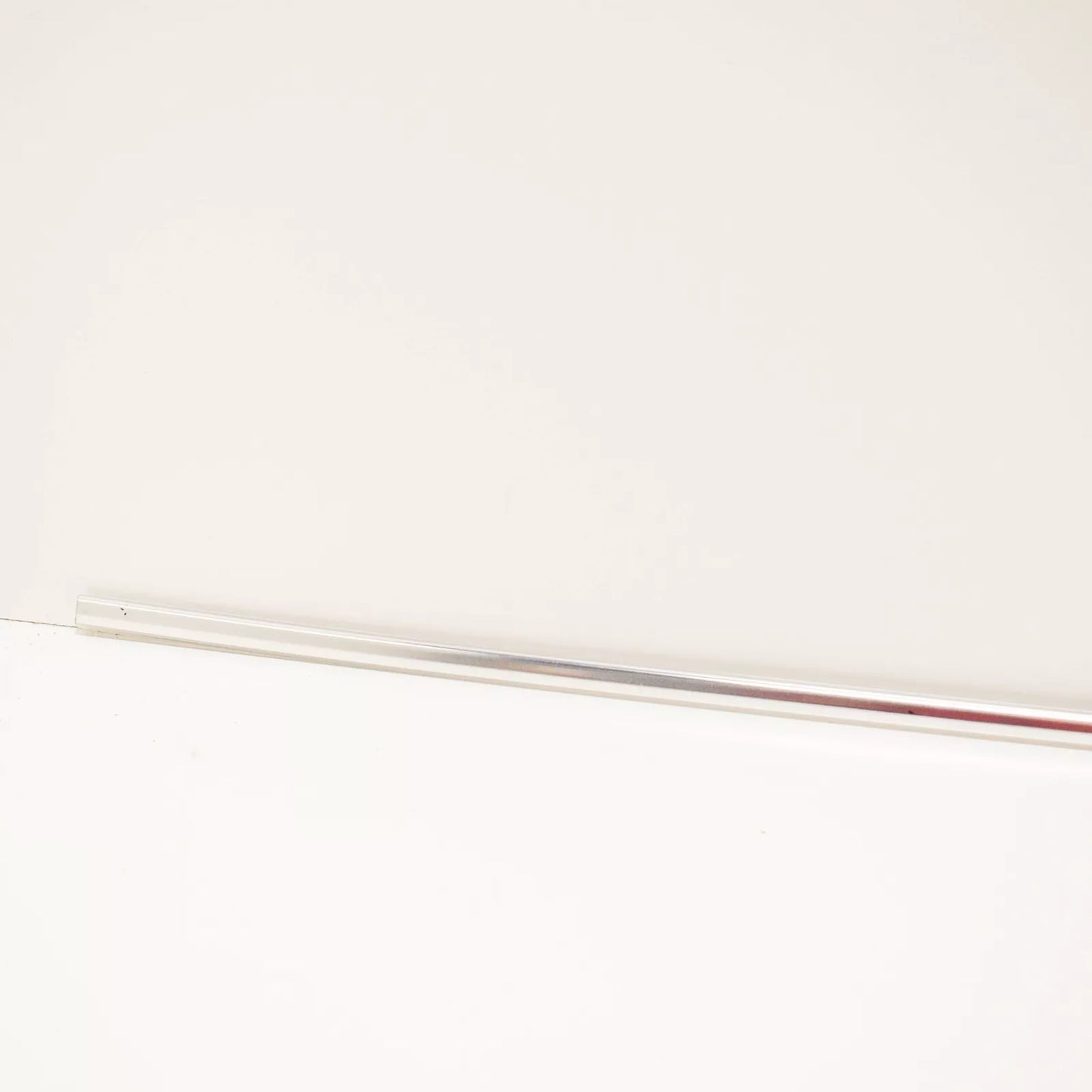 NEW BMW 3 E30 REAR WINDSHIELD LOWER MOULDING CHROME 51311884410 ORIGINAL