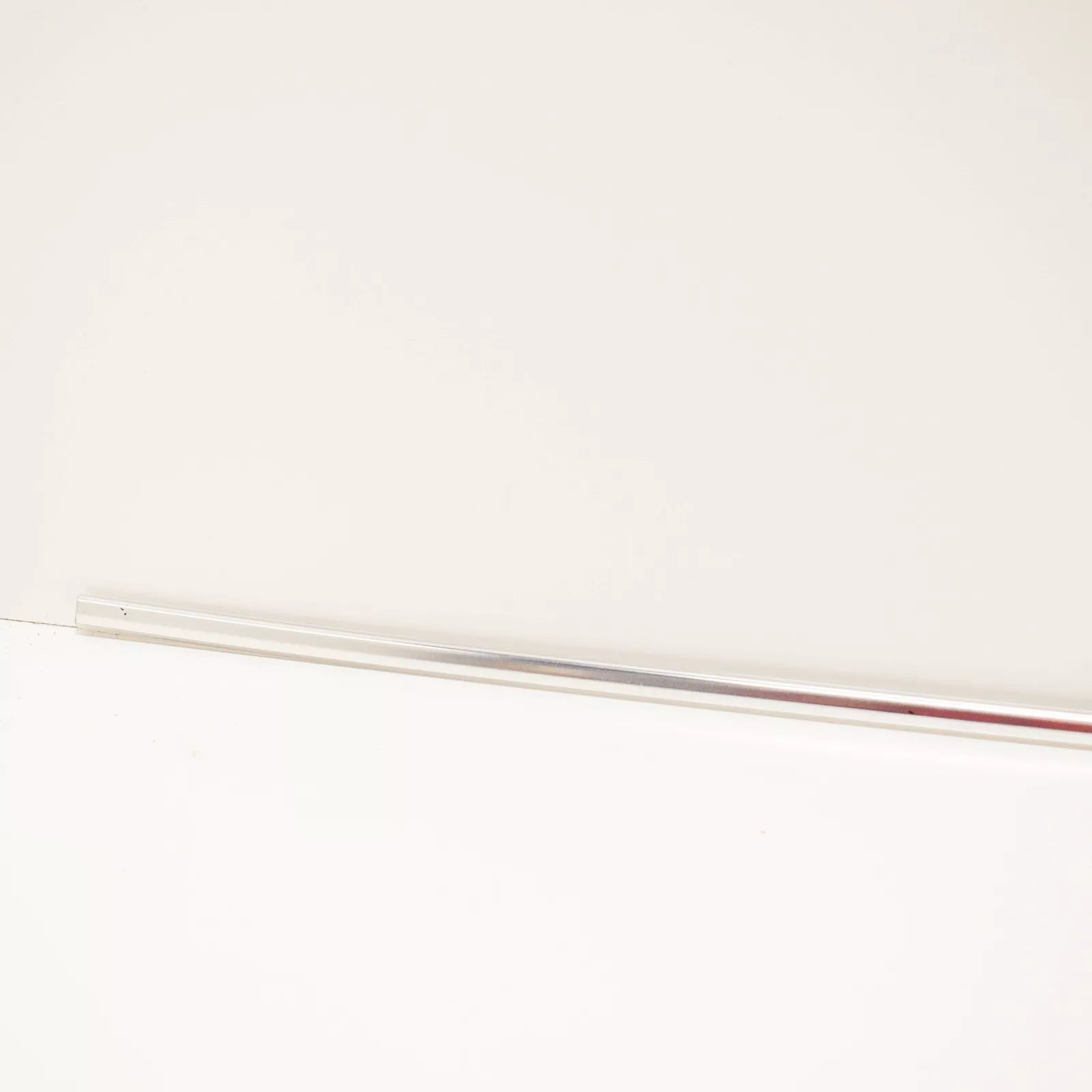 NEW BMW 3 E30 REAR WINDSHIELD LOWER MOULDING CHROME 51311884410 ORIGINAL