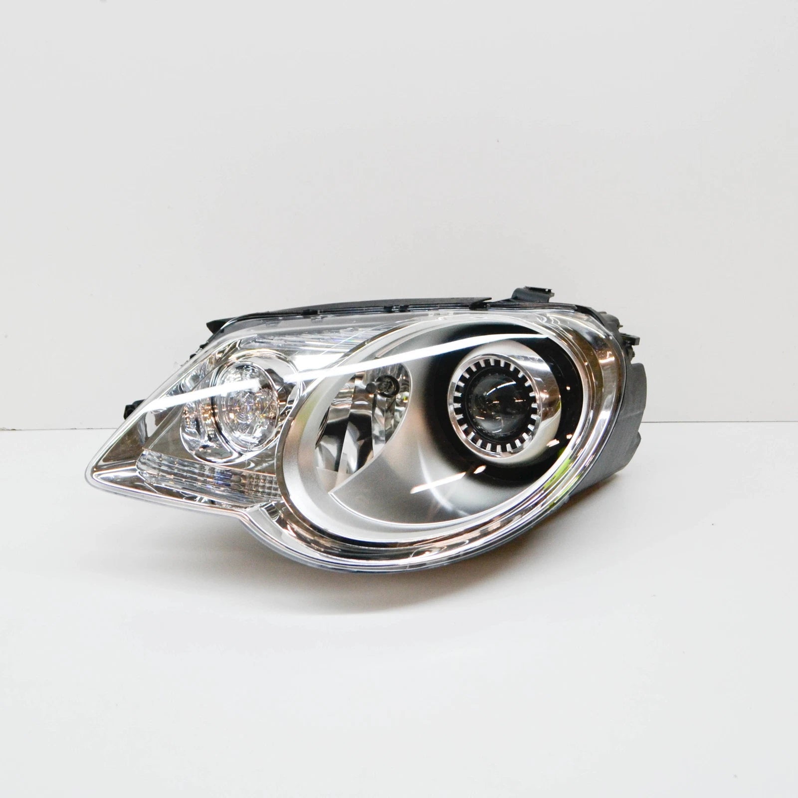 NEW VW EOS 1F FRONT LEFT HEADLIGHT RHD 1Q1941753B ORIGINAL