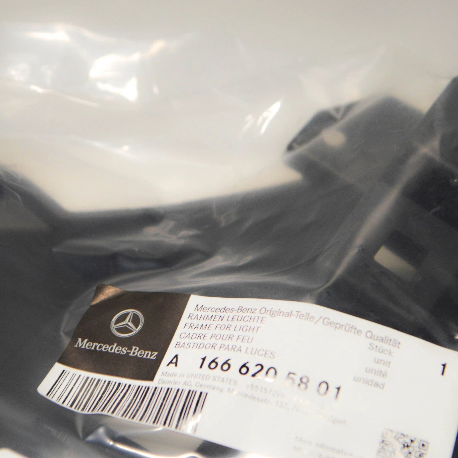 NEW MERCEDES-BENZ GL W166 FRONT RIGHT SIDE LIGHT FRAME MOUNT A1666205801