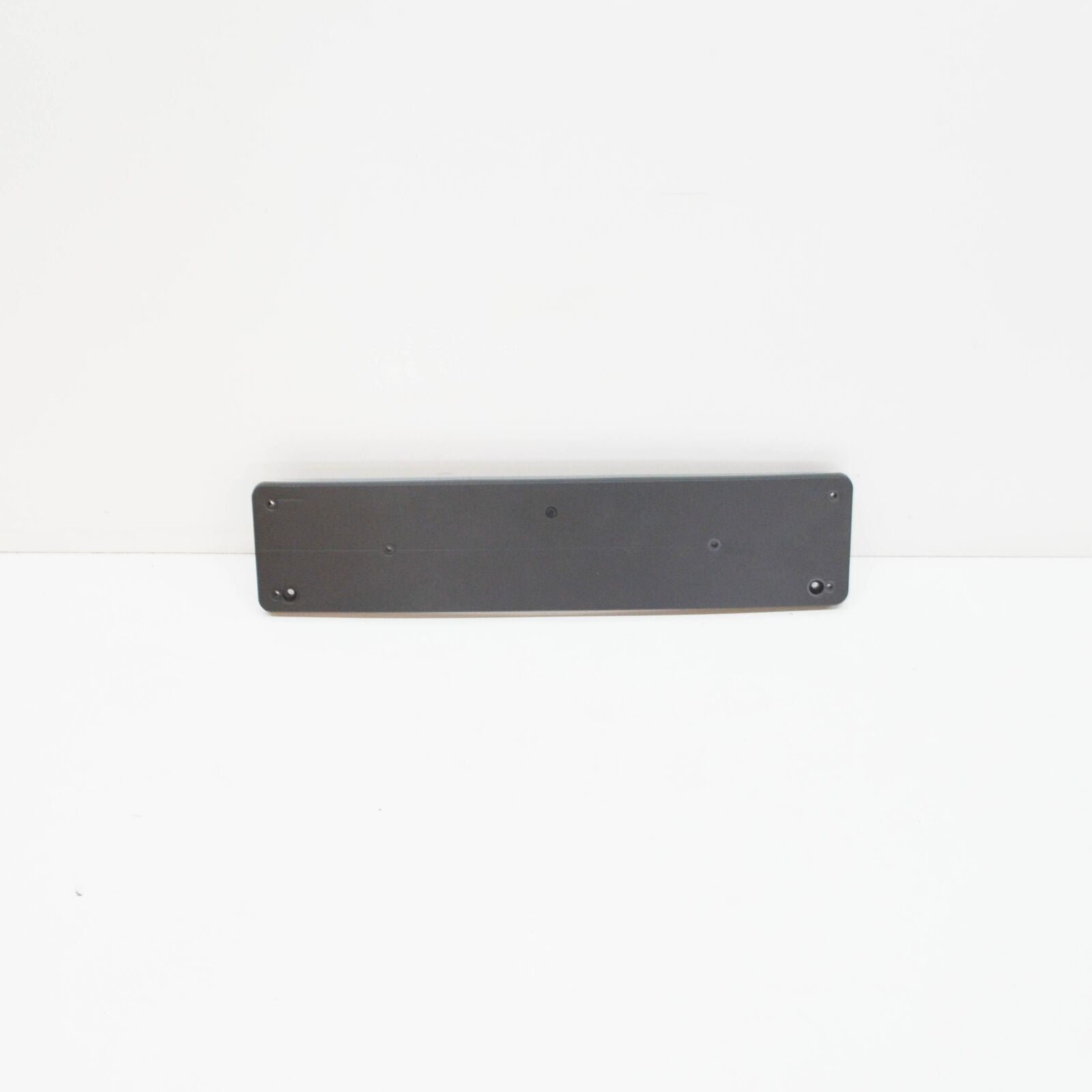 NEW MB E W211 FRONT BUMPER LICENSE PLATE FILLER A2118850181 ORIGINAL