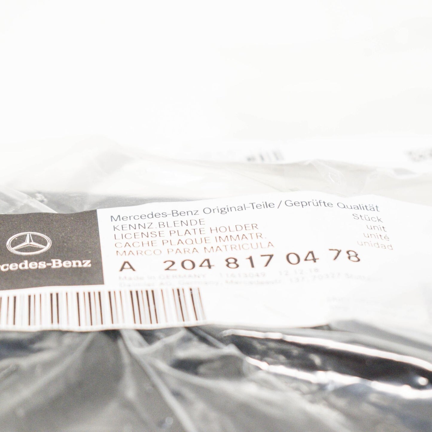 NEW MERCEDES-BENZ C W204 FRONT BUMPER LICENSE PLATE MOULDING A2048170478