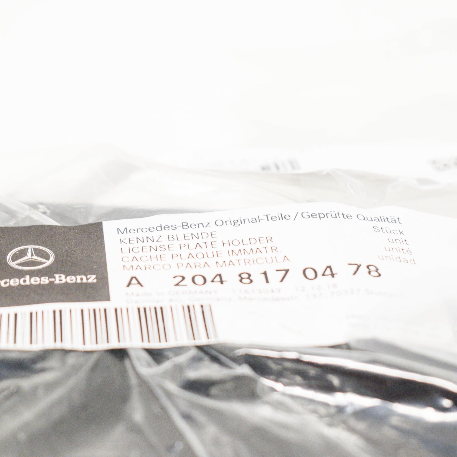 NEW MERCEDES-BENZ C W204 FRONT BUMPER LICENSE PLATE MOULDING A2048170478