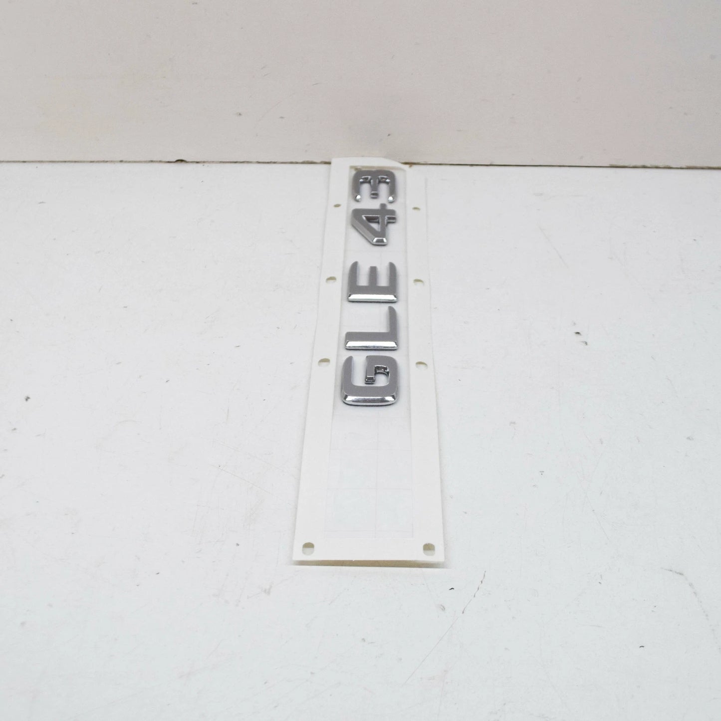 NEW MB GLE W166 REAR TRUNK BOOTLID EMBLEM BADGE A1668176400