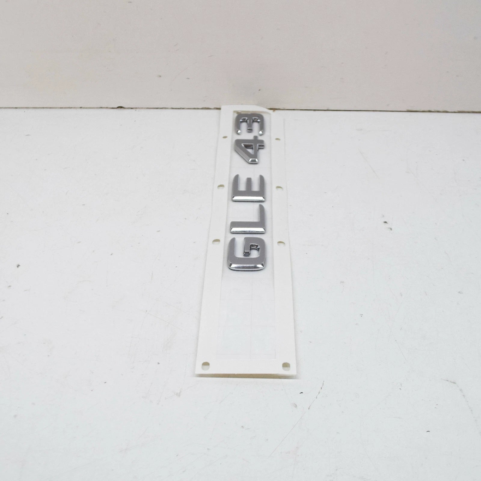 NEW MB GLE W166 REAR TRUNK BOOTLID EMBLEM BADGE A1668176400