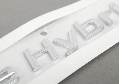 NEW BMW HYBRID 7 F01 REAR LEFT EMBLEM BAGDE 51147346553 7346553 ORIGINAL