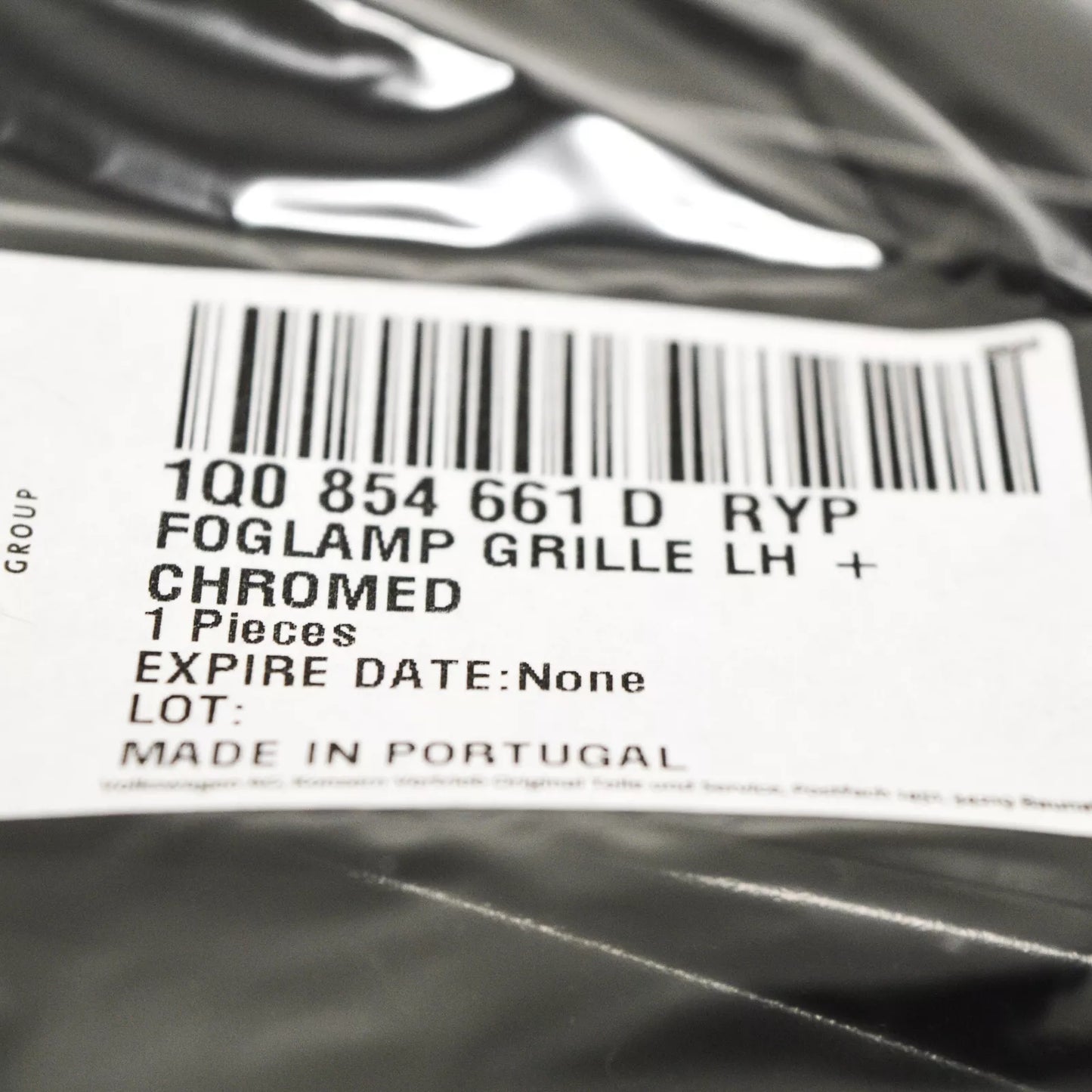 NEW VW EOS 1F7 FRONT LEFT FOG LIGHT GRILLE 1Q0854661DRYP GENUINE