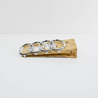 NEW AUDI RS7 SPORTBACK 4K8 FRONT RADIATOR GRILLE BADGE 4K88536052ZZ ORIGINAL