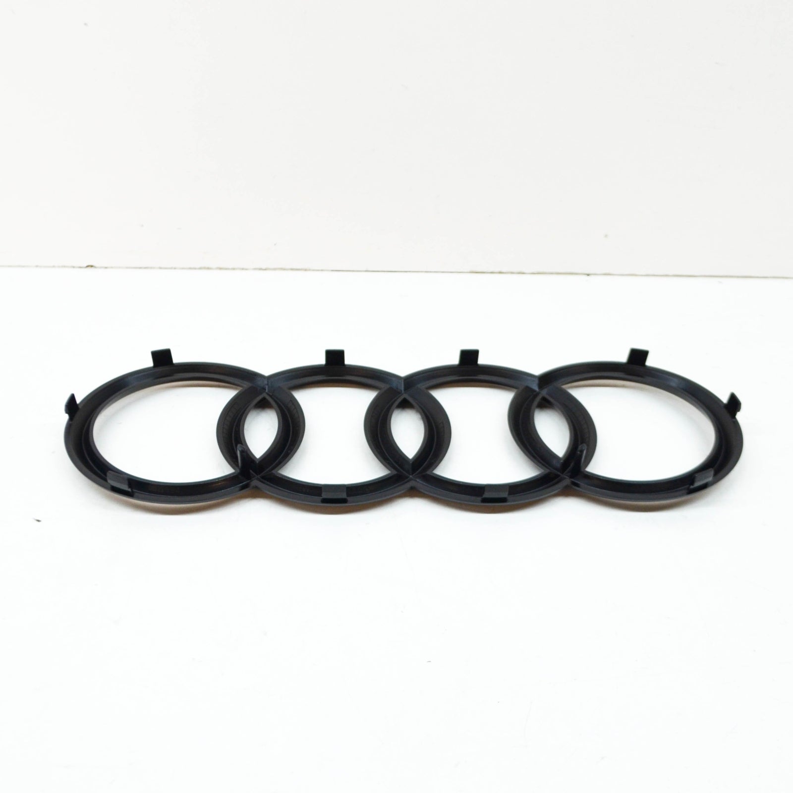 NEW AUDI Q7 4M FRONT BUMPER RADIATOR GRILLE BADGE LOGO 4M0853605T94 ORIGINAL