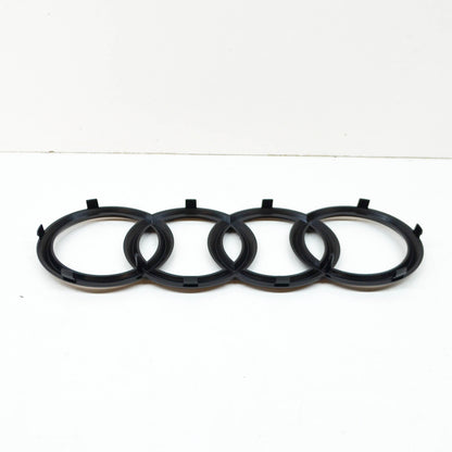 NEW AUDI Q7 4M FRONT BUMPER RADIATOR GRILLE BADGE LOGO 4M0853605T94 ORIGINAL