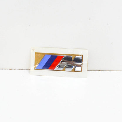 NEW BMW X6 E71 REAR TRUNK BOOT LID EMBLEM BADGE LABEL 51147250850 ORIGINAL