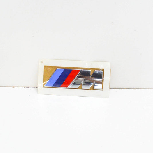 NEW BMW X6 E71 REAR TRUNK BOOT LID EMBLEM BADGE LABEL 51147250850 ORIGINAL