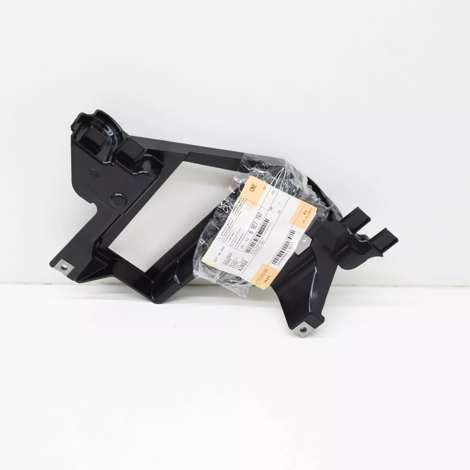 NEW BMW X5 E53 FRONT LEFT HEADLIGHT BRACKET 63126927797 6927797 ORIGINAL