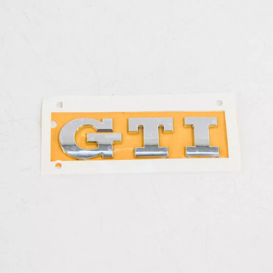 NEW VOLKSWAGEN GOLF MK7 TRUNK LID GTI EMBLEM 5G0853675Q2ZZ ORIGINAL