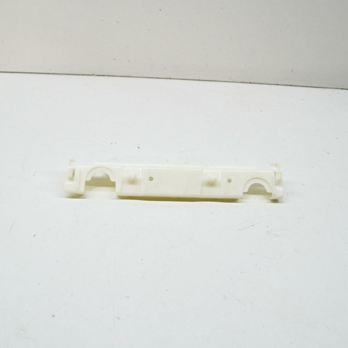 NEW MB E COUPE C207 FRONT RIGHT SIDE PLASTIC SKIRT HOLDER A2076980127 ORIGINAL