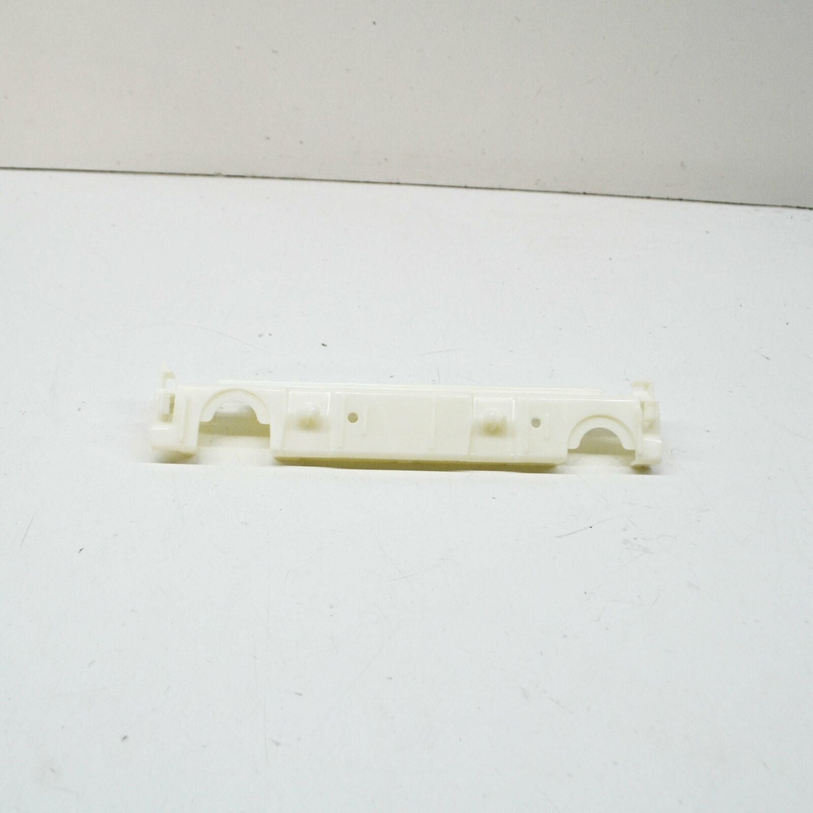 NEW MB E COUPE C207 FRONT RIGHT SIDE PLASTIC SKIRT HOLDER A2076980127 ORIGINAL