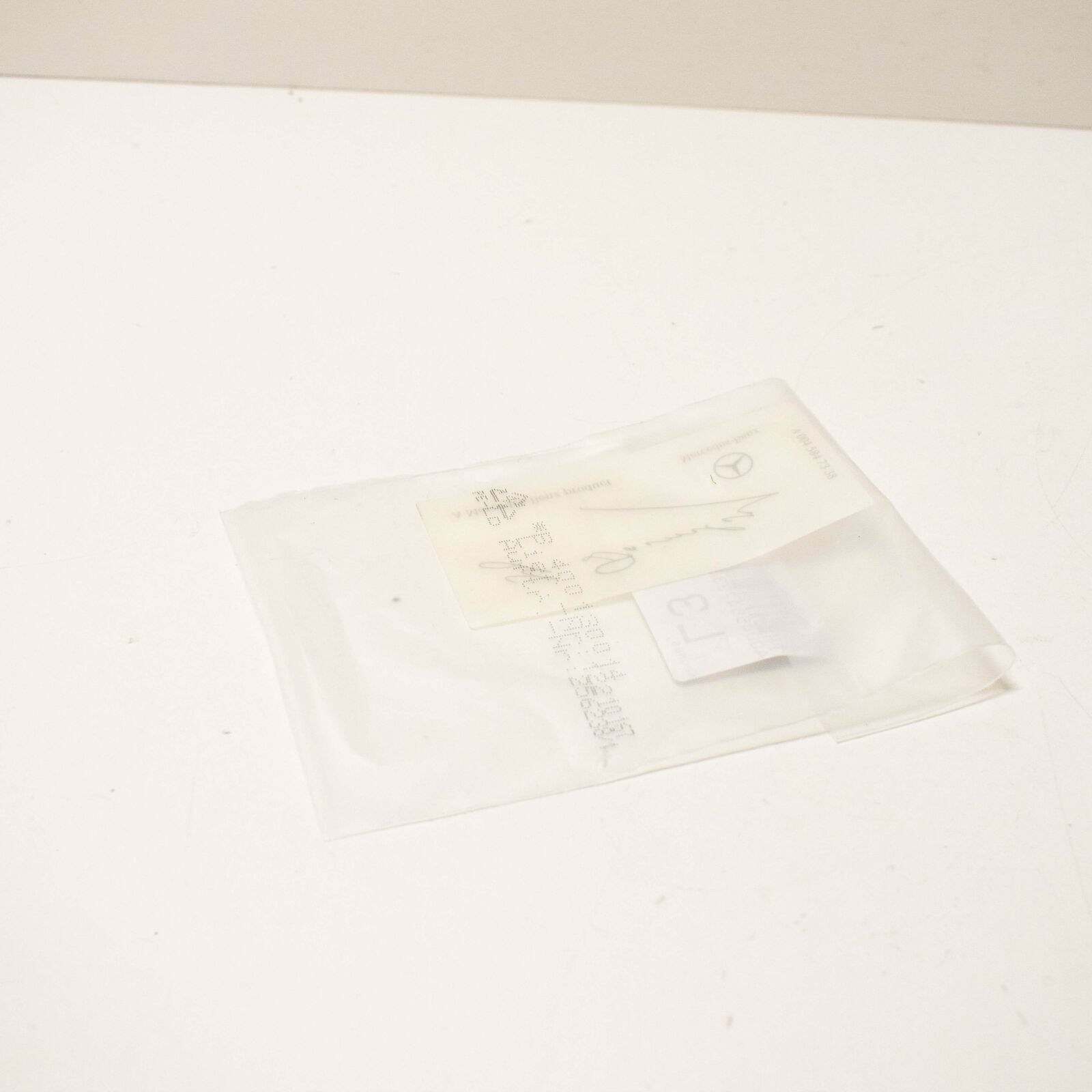 NEW MERCEDES G DAIMLER SIGNED CLEAR WINDSHIELD GLASS DECAL A0045847338 ORIGINAL