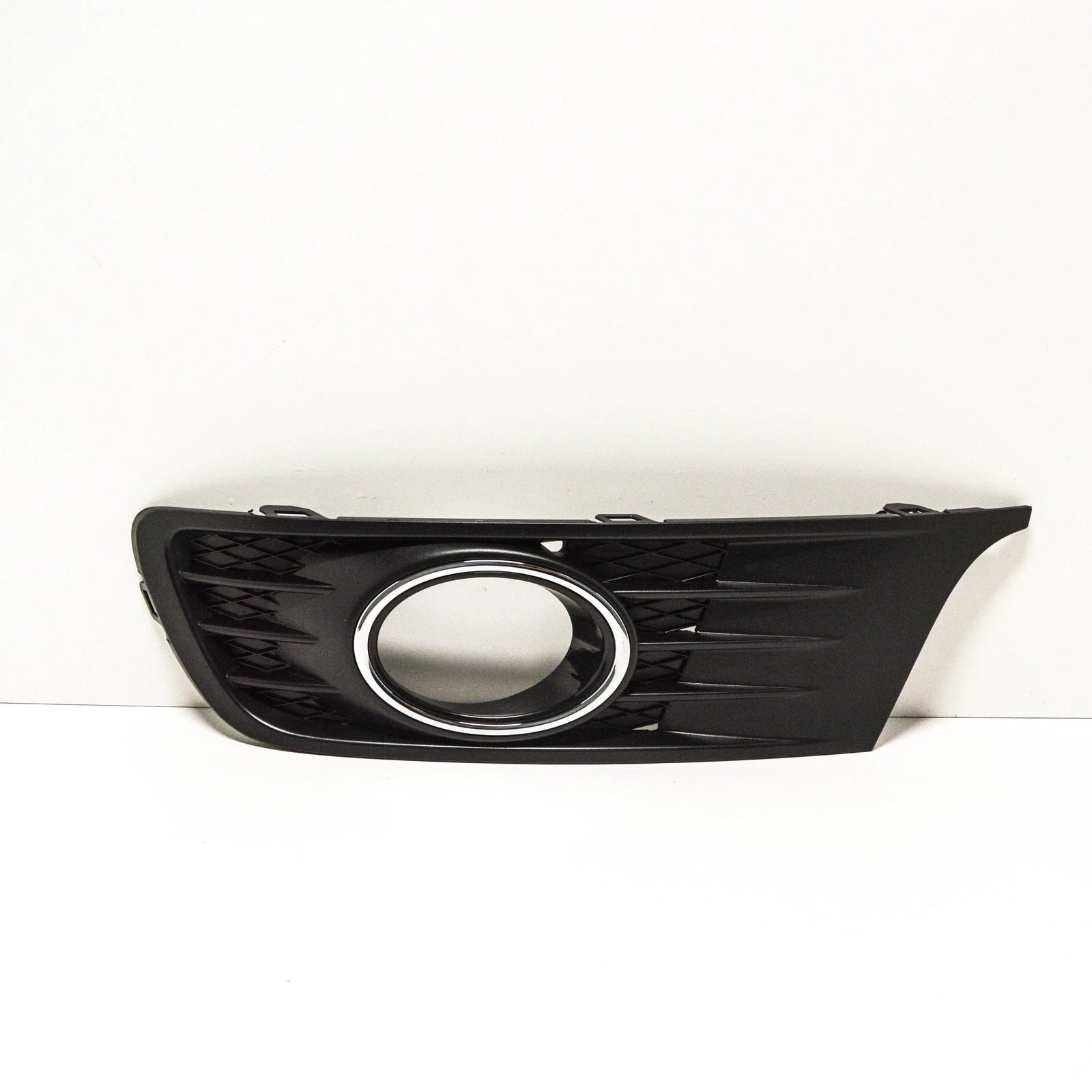 NEW VW EOS 1F7 FRONT LEFT FOG LIGHT GRILLE 1Q0854661DRYP GENUINE