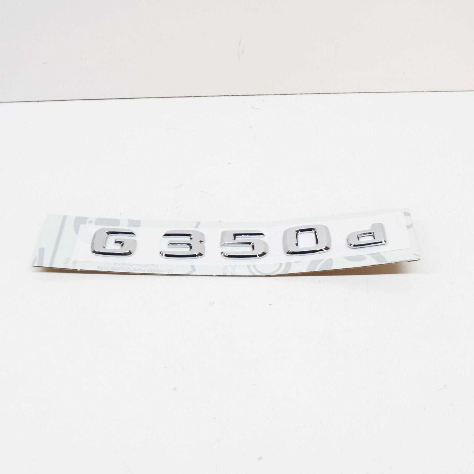 NEW MERCEDES-BENZ G W463 REAR MODEL PLATE BADGE A4638171400 ORIGINAL