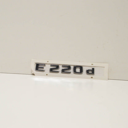 NEW MERCEDES-BENZ E-CLASS W213 REAR EMBLEM BADGE A2138175700 ORIGINAL