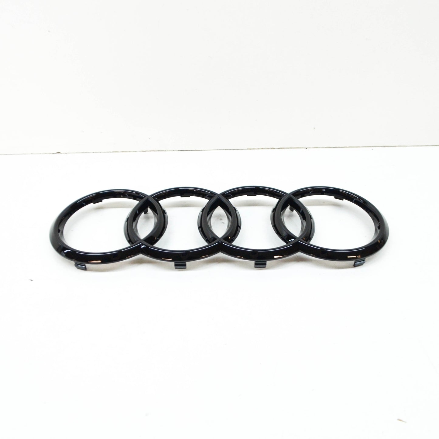 NEW AUDI Q7 4M FRONT BUMPER RADIATOR GRILLE BADGE LOGO 4M0853605T94 ORIGINAL