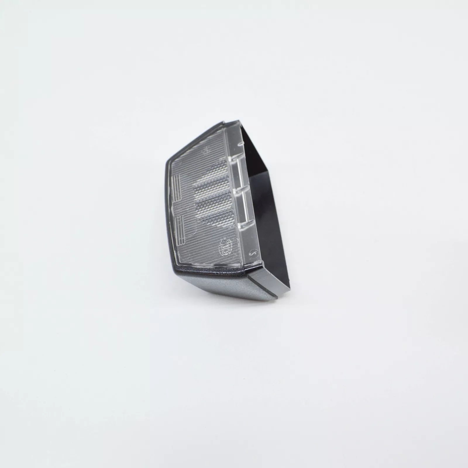 NEW VOLKSWAGEN TRANSPORTER T5 NUMBER PLATE LIGHT HOLDER TRIM 7F0943111 ORIGINAL