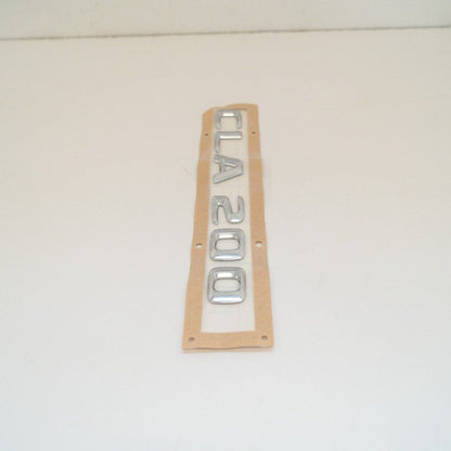 NEW MERCEDES BENZ CLA C117 REAR TRUNK BADGE EMBLEM 	A1178171015 ORIGINAL