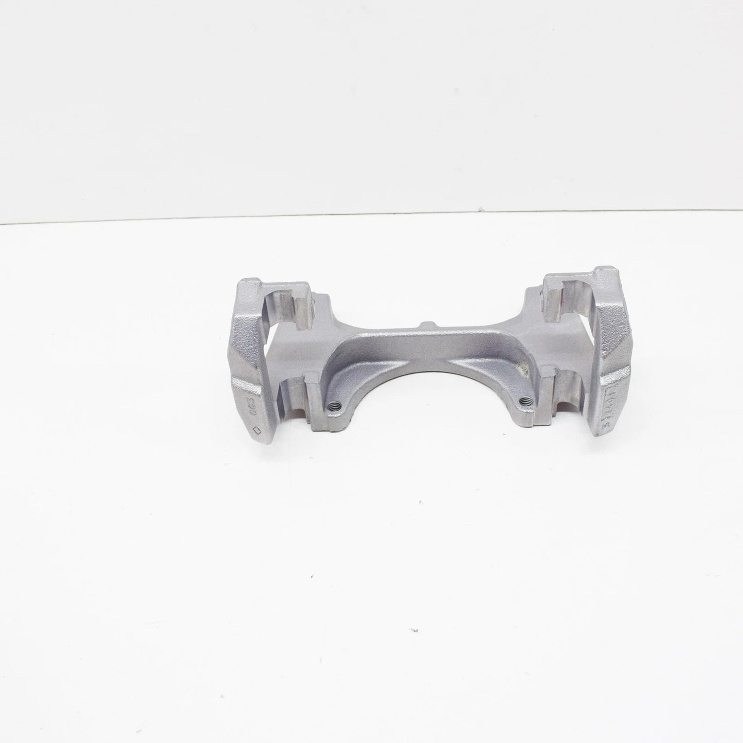NEW VOLKSWAGEN EOS FRONT BRAKE CALIPER CARRIER 1K0615125B ORIGINAL