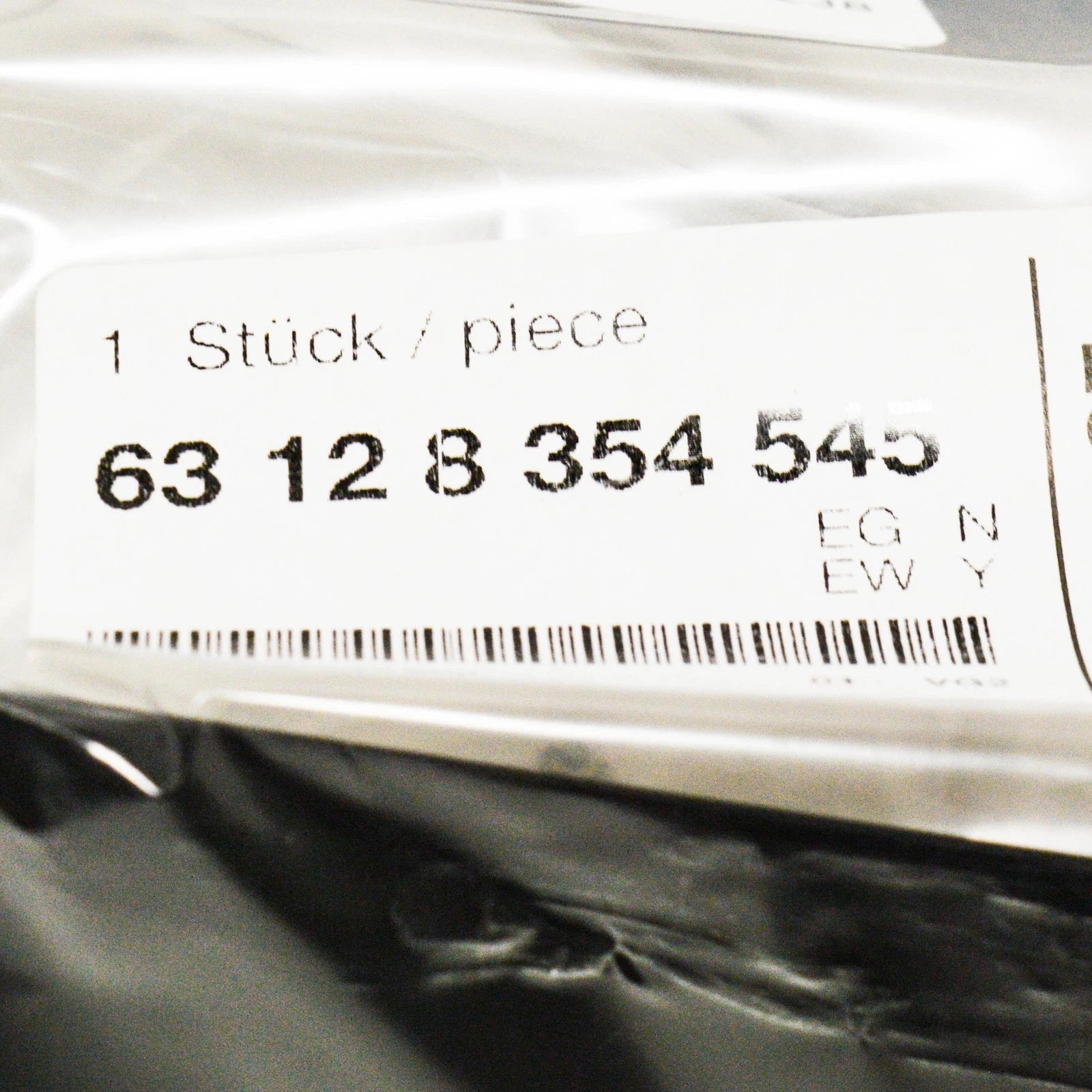 NEW BMW 8 E31 COUPE HEADLIGHT COVERING FRONT LEFT 63128354545 8354545 ORIGINAL