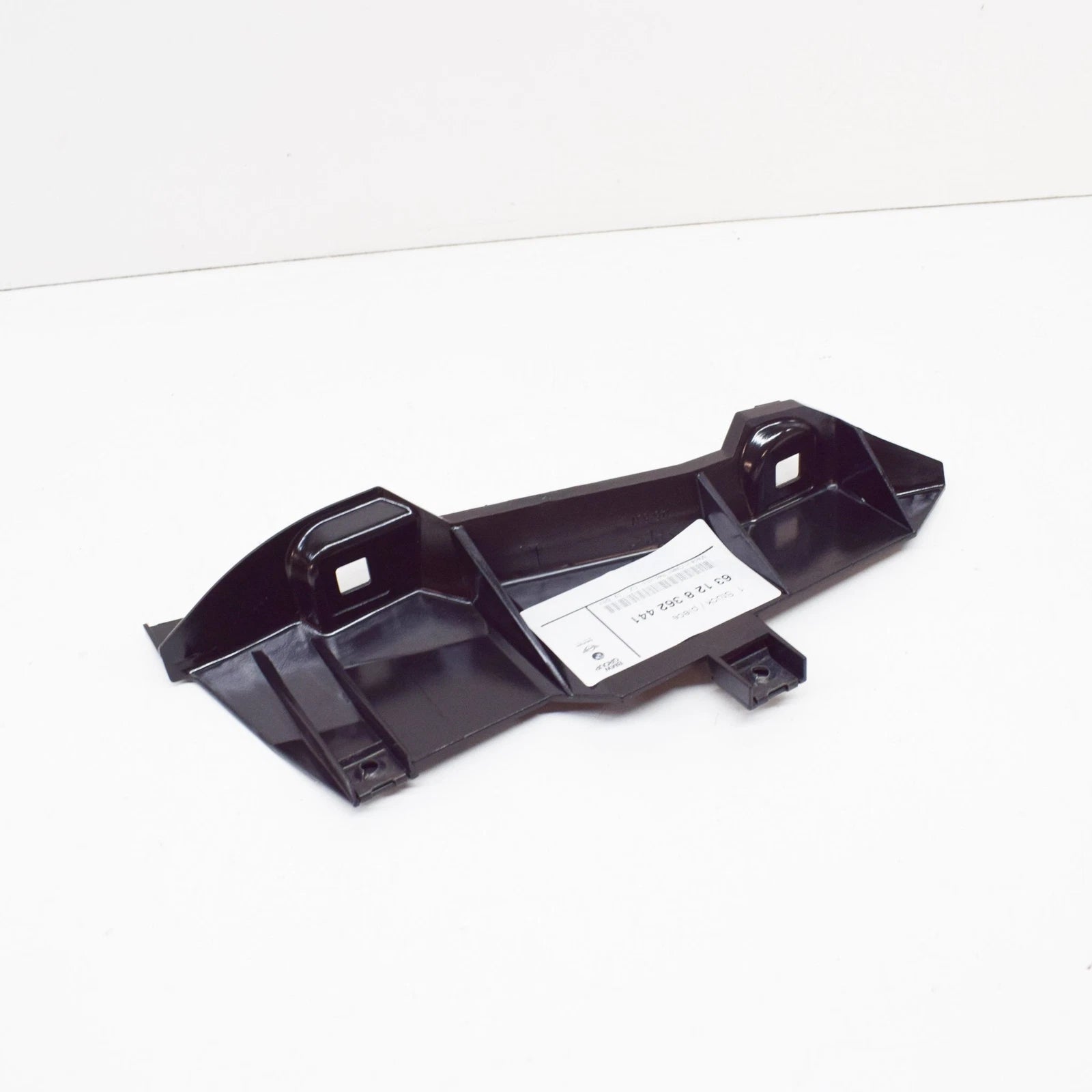 NEW BMW 5 E39 LEFT SIDE HEADLIGHT BRACKET 63128362441 ORIGINAL