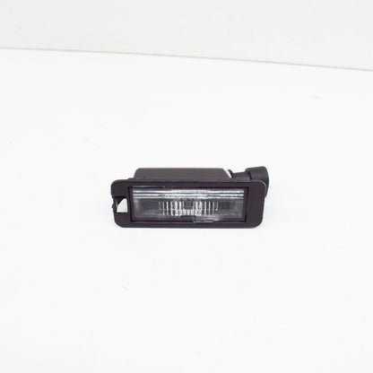 NEW VOLKSWAGEN FOX LICENSE PLATE LIGHT 1JE943021A ORIGINAL