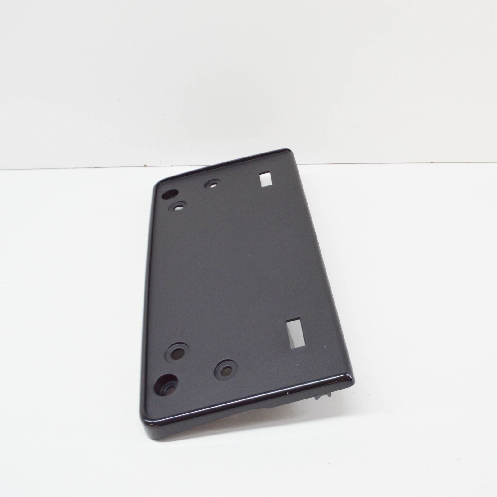 NEW VW TOUAREG 7P FRONT LICENSE PLATE HOLDER 7P6807287F ORIGINAL