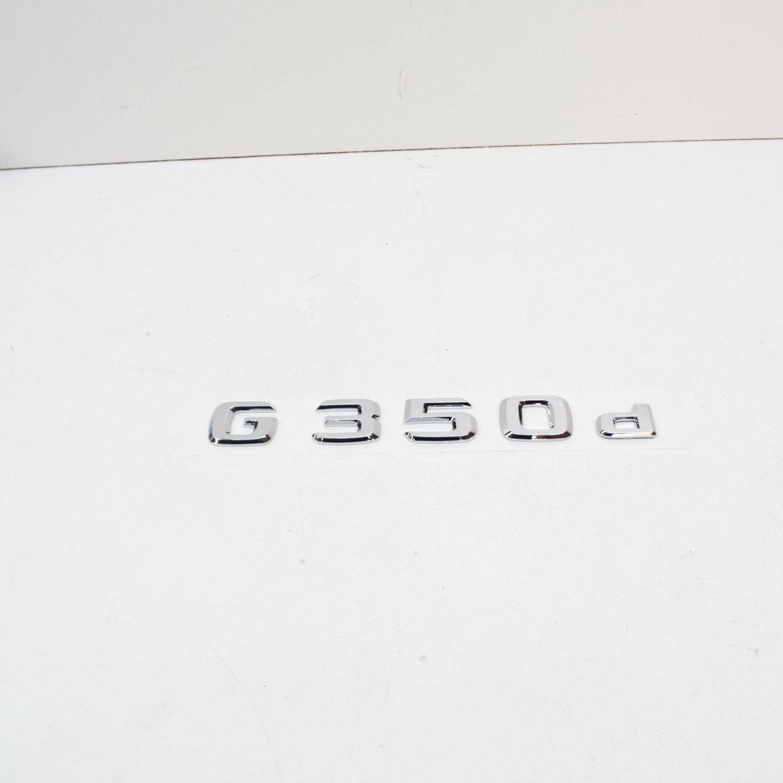 NEW MERCEDES-BENZ G W463 REAR MODEL PLATE BADGE A4638171400 ORIGINAL