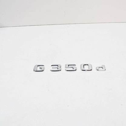 NEW MERCEDES-BENZ G W463 REAR MODEL PLATE BADGE A4638171400 ORIGINAL