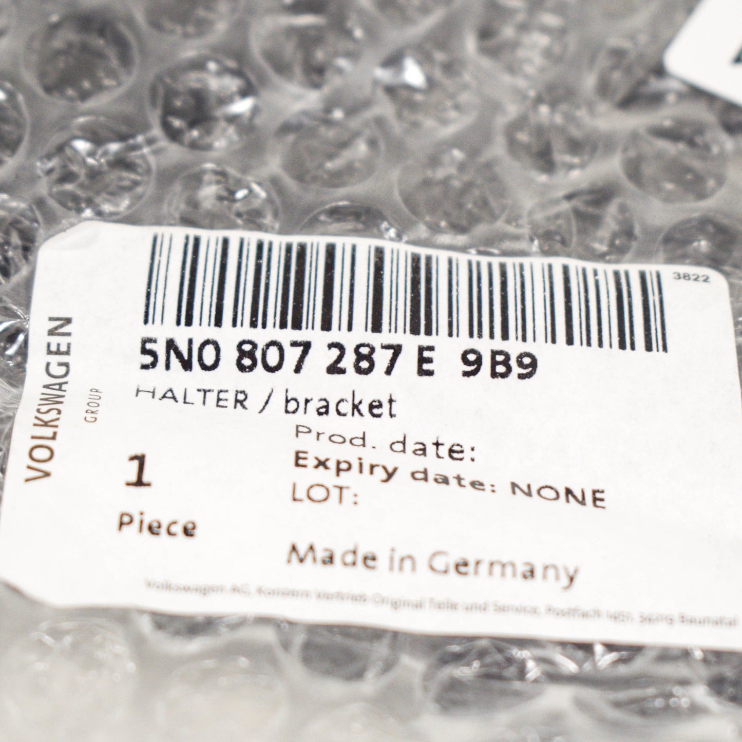 NEW VW TIGUAN 5N FRONT BUMPER LICENSE PLATE HOLDER 5N0807287E9B9 ORIGINAL