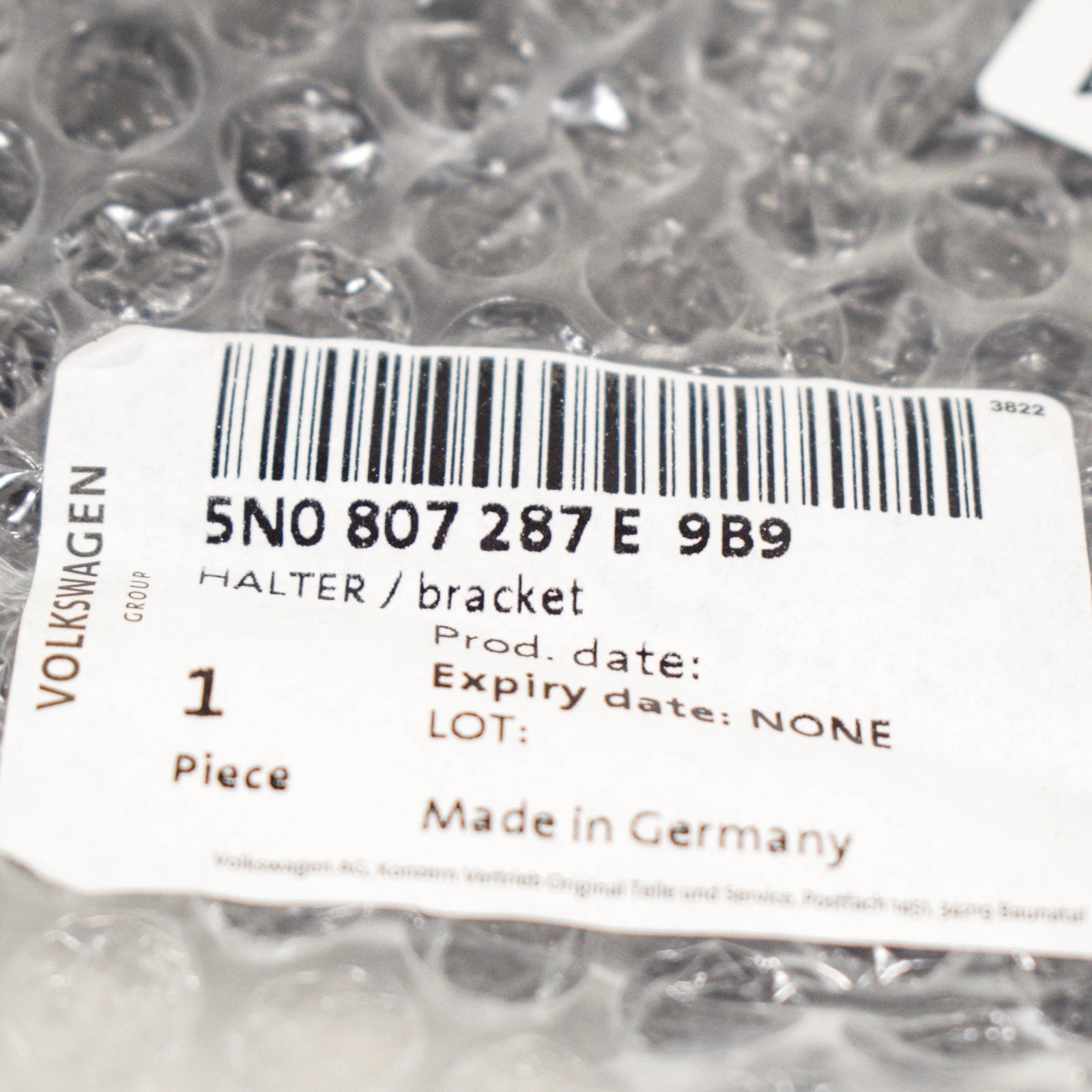 NEW VW TIGUAN 5N FRONT BUMPER LICENSE PLATE HOLDER 5N0807287E9B9 ORIGINAL