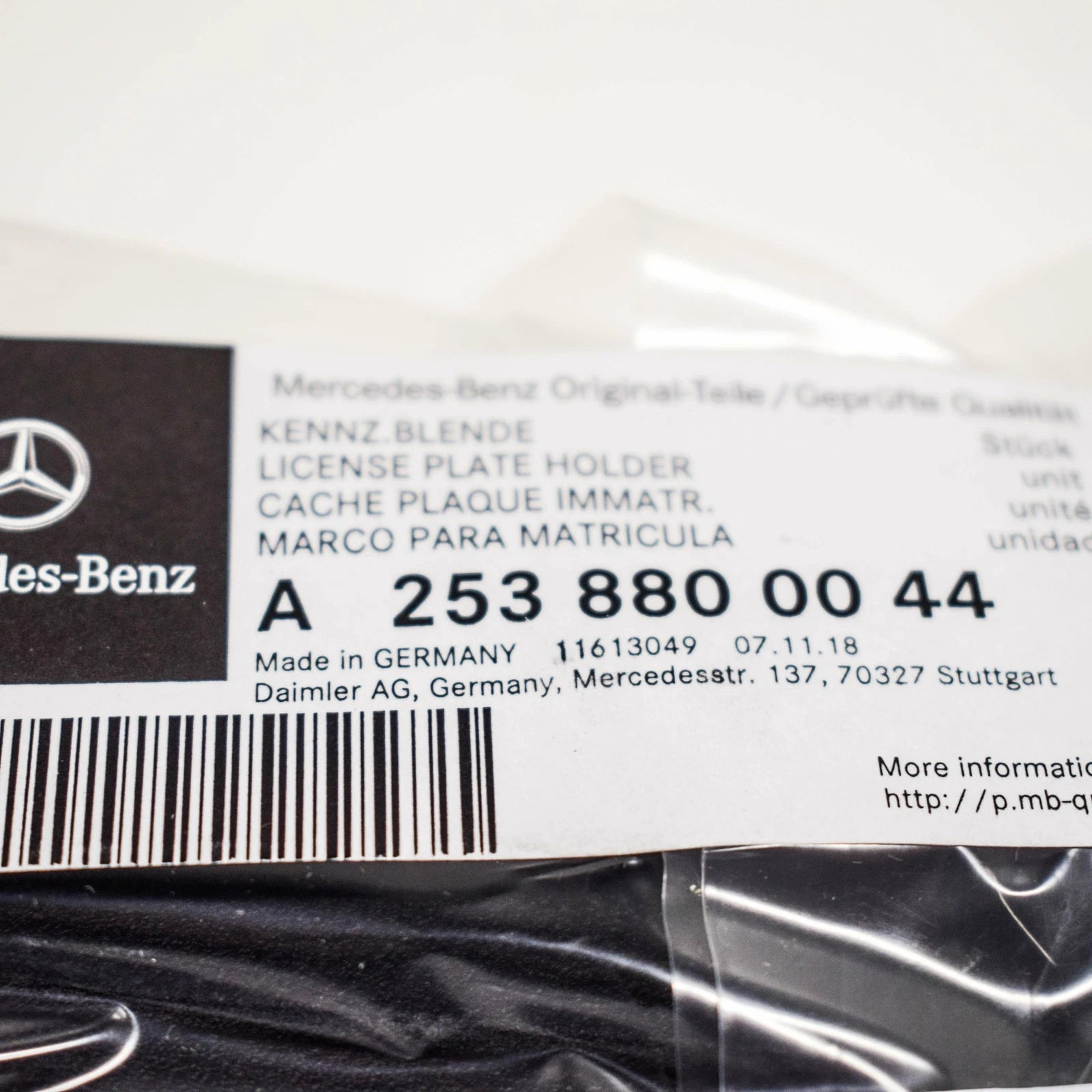 NEW MB GLC X253 FRONT BUMPER LICENSE PLATE MOLDING A2538800044 ORIGINAL