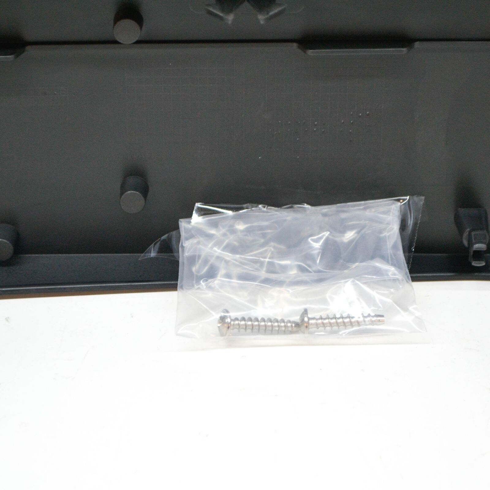 NEW MB GLC X253 FRONT BUMPER LICENSE PLATE HOLDER A2538802102 ORIGINAL