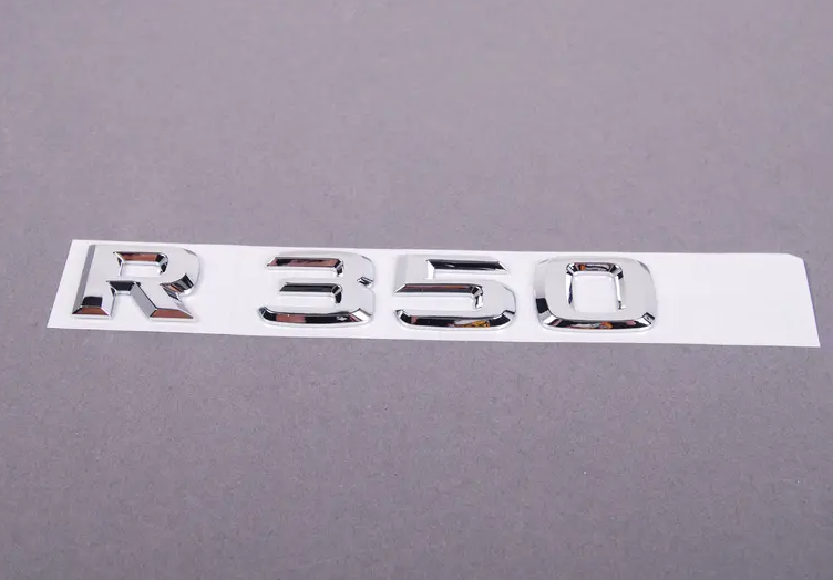 NEW MERCEDES-BENZ R-CLASS W251 REAR PANEL DOOR BADGE A2518170215 ORIGINAL