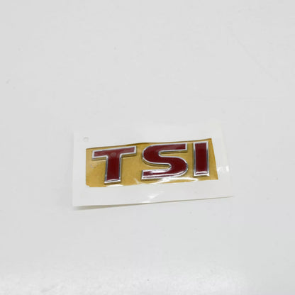 NEW VW TIGUAN 5N REAR TRUNK TSI BADGE EMBLEM 1Q0853675Q GQ F ORIGINAL