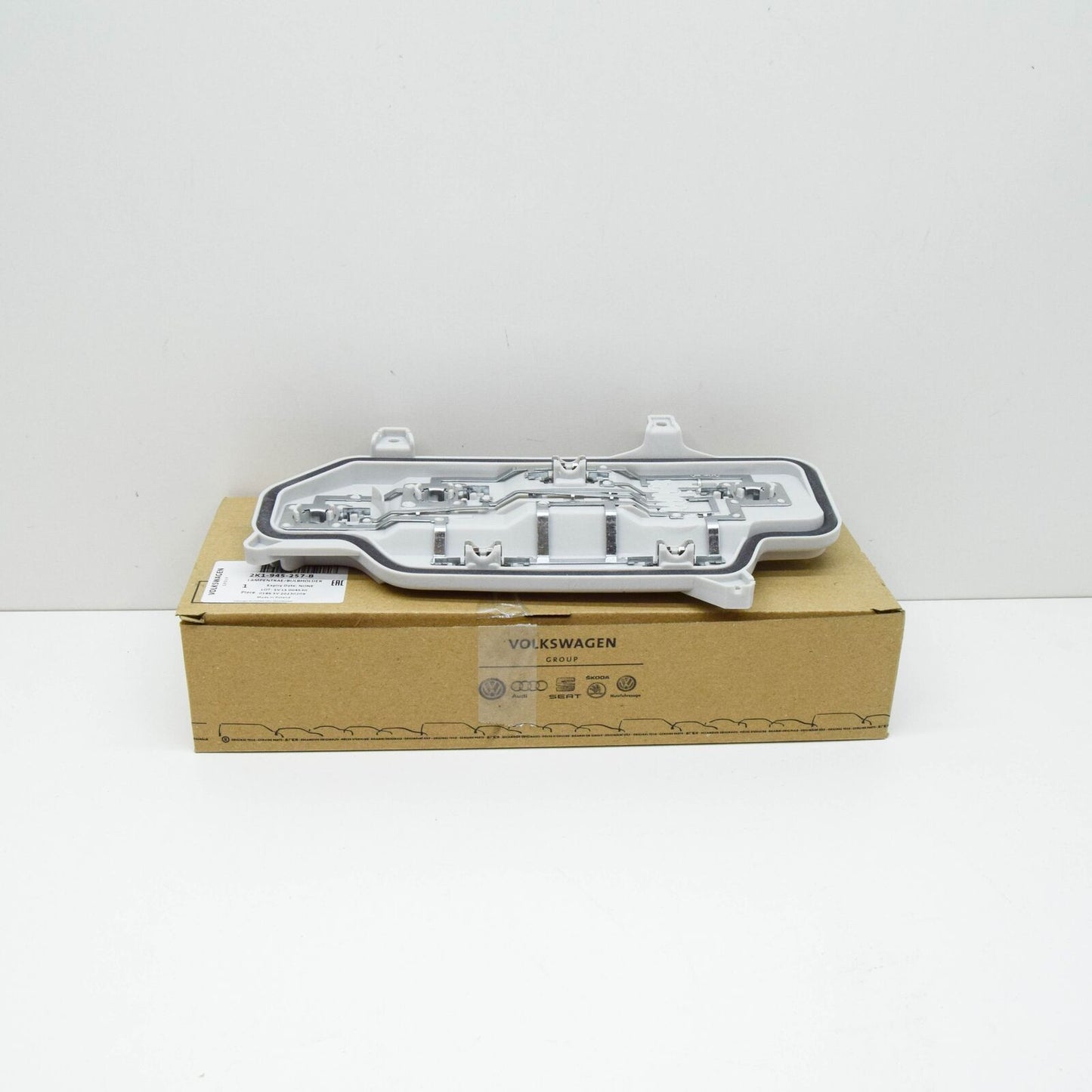 NEW VOLKSWAGEN CADDY MK3 REAR LEFT BULB CARRIER 2K1945257B ORIGINAL