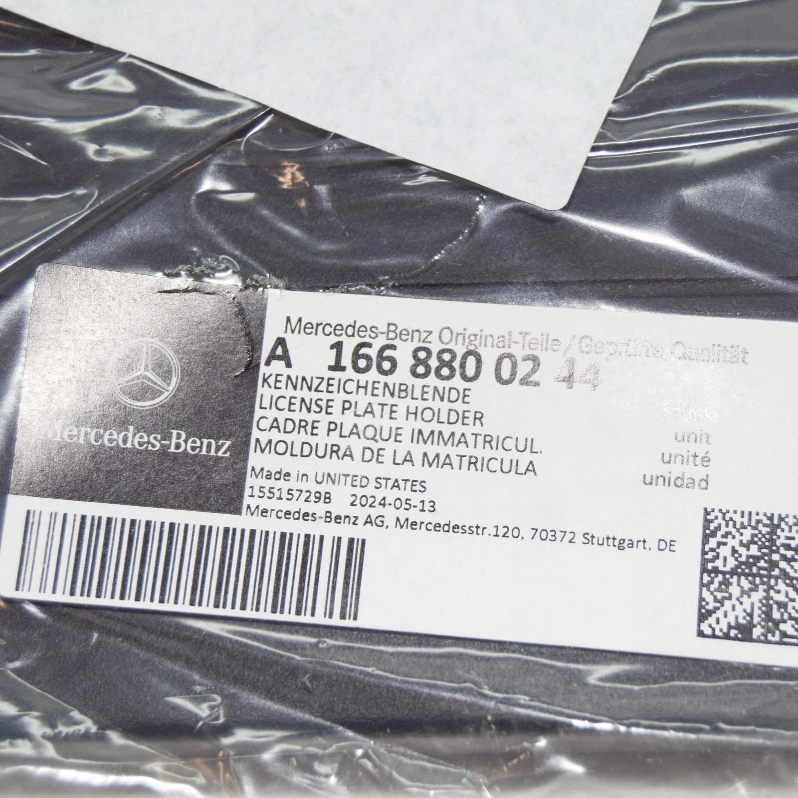 NEW MERCEDES-BENZ ML W166 FRONT BUMPER LICENSE PLATE HOLDER A1668800244 ORIGINAL