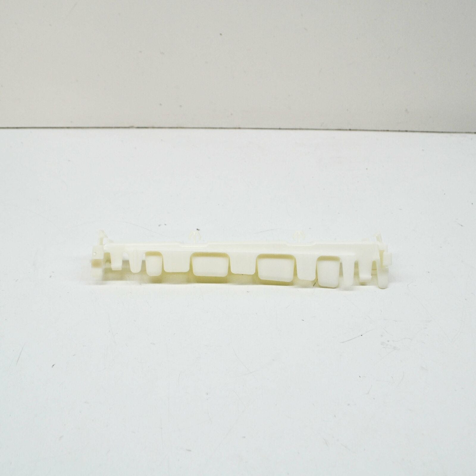 NEW MB E COUPE C207 FRONT RIGHT SIDE PLASTIC SKIRT HOLDER A2076980127 ORIGINAL